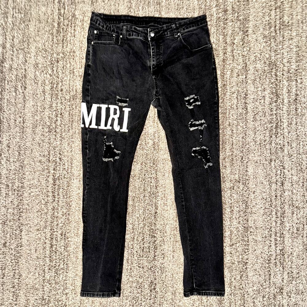 Amiri Embroidered Logo Jeans in Aged Black Size 32